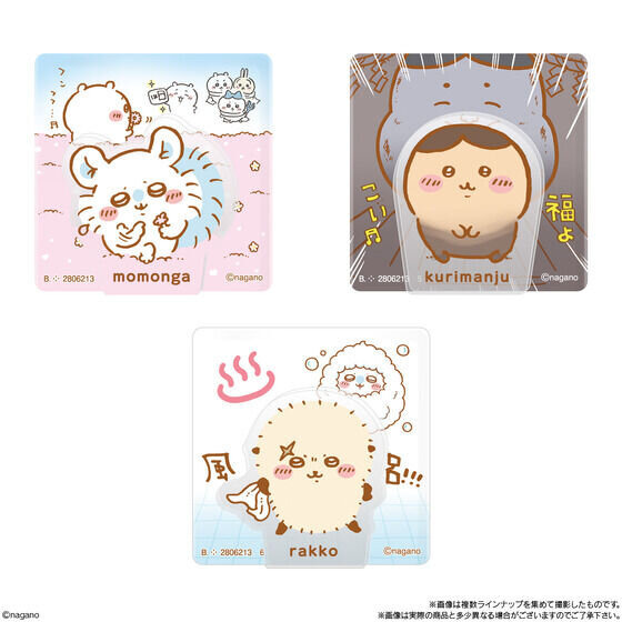 Close-up of Chiikawa acrylic clips showing characters eating watermelon, highlighting the intricate details.