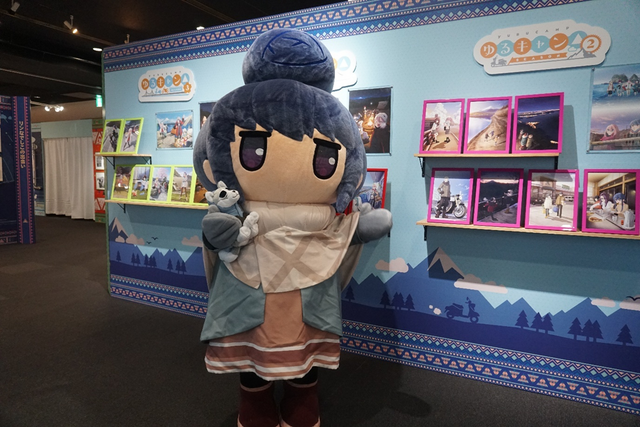 Exhibit showcasing scenes from the Yuru Camp anime.