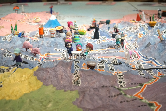 Overview of the Yuru Camp giant diorama with miniature figures.