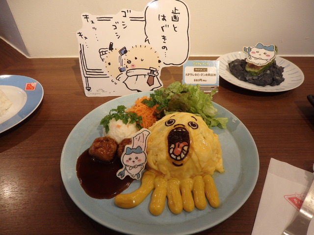 Chiikawa character art on the wall